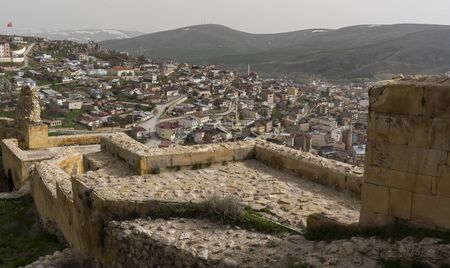 Bayburt, Turkey - May 6, 2019: Veiw of the town of Bayburt in Turkey with houses, flats, mosques and a castle wall.のeditorial素材