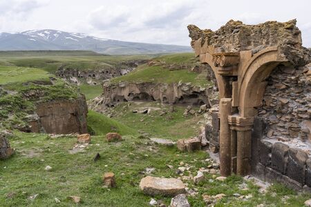 Ani, Turkey - May 9, 2019: Ruins of the old Armenian town Ani with churches and snowy mountains in the background, Turkey.のeditorial素材