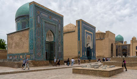 Samarqand, Uzbekistan - June 9, 2019: Mausoleums at Shah i Zinda graveyard with tourists in Samarqand in Uzbekistan.のeditorial素材