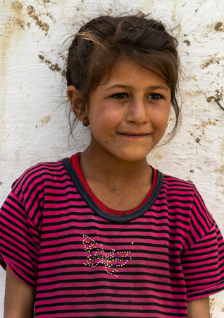 Wakhan, Tajikistan - June 20, 2020: Portrait of a girl in the Wakhan Valley at the Pamir Highway in Tajikistan.のeditorial素材
