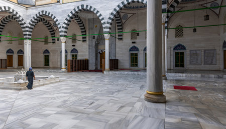 Ashgabat, Turkmenistan - June 1, 2019: The Ertugrul Gazi Mosque, courtyard, in the white and marble...