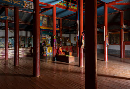 Shankh, Mongolia - August 29, 2019: Interior of temple of the Shankh Monastery with praying monk, Mongolia.のeditorial素材