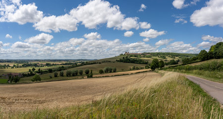 Fields in the area of Chateauneuf with castle on a summers day, burgundy, Franceの写真素材