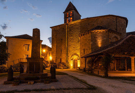 Saint-Jean-de-Cole, France - June 12, 2022: Church at night with monument in the village of Saint-Jean-de-Cole one of the 'Plus beaux village de France'.のeditorial素材