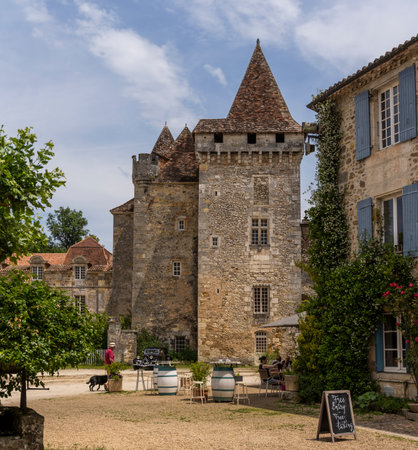 Saint-Jean-de-Cole, France - June 12, 2022: Chateau de la Marthonie and restaurant in the village of Saint-Jean-de-Cole one of the 'Plus beaux village de France'.のeditorial素材