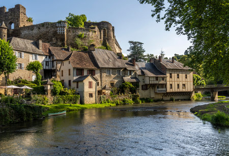 Segur-le-Chateau, France - June13, 2022: The river L'Auvezere and castle of the village of Segur-le-Chateau one of the 'Les Plus Beaux Villages de France'.のeditorial素材