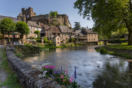 Segur-le-Chateau, France - June13, 2022: The river L'Auvezere at the town of Segur-le-Chateau one of the 'Les Plus Beaux Villages de France'.のeditorial素材