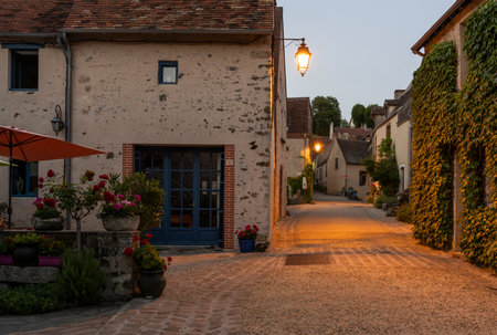 Gargilesse-Dampierre, France - June 14, 2022: Street, terrace and small street in the evening in the small village Gargilesse, one of the Plus Beaux Villages de France.のeditorial素材