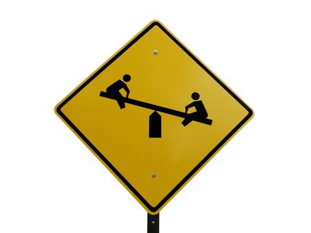 Tetter totter children's playground caution street sign.の写真素材