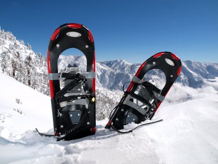 Snowshoes in a deep drift on a California mountain peak.     の写真素材