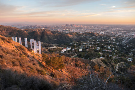 Los Angeles, California, USA - February 4, 2016:  Hollywood sign and downtown Los Angeles dusk cityscape view.のeditorial素材