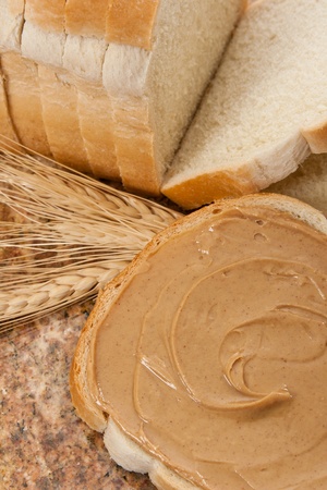 Delicious peanut butter demonstrates  a healthy snack and food allergenの写真素材