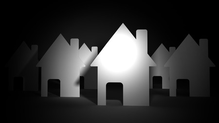 Close up of paper houses on black backgroundの写真素材