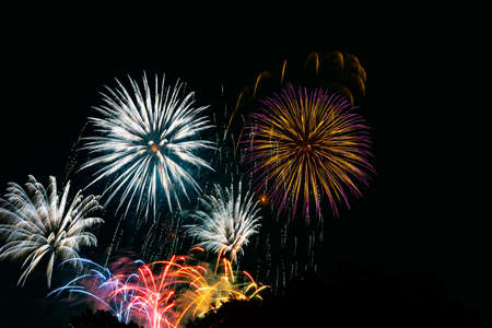 Beautiful Fireworks Celebration In Japan | Summer Season Night Festival | Near The Lake | No People  | Firework With Colourful Shadowの写真素材