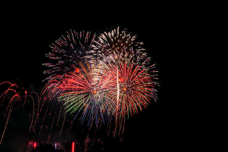 Beautiful Fireworks Celebration In Japan | Summer Season Night Festival | Near The Lake | No People  | Firework With Colourful Shadowの写真素材