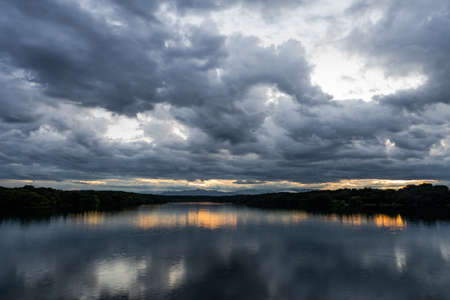 Cloudy Weather with Sunrise | Horizon lake | The Shadow Of The Clouds On The Water | Brighter Colours | No People Japan lakeの写真素材