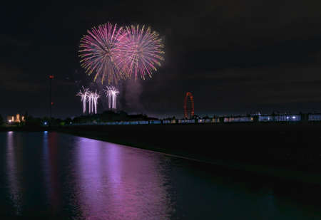 Beautiful Fireworks Celebration In Japan | Summer Season Night Festival | Near The Lake | No People | Firework With Colourful Shadowの写真素材