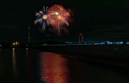 Beautiful Fireworks Celebration In Japan | Summer Season Night Festival | Near The Lake | No People | Firework With Colourful Shadowの写真素材