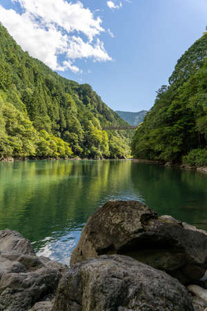 Beautiful Nature River Place. Reflection Landscape in Japan.deep water and mountainの写真素材
