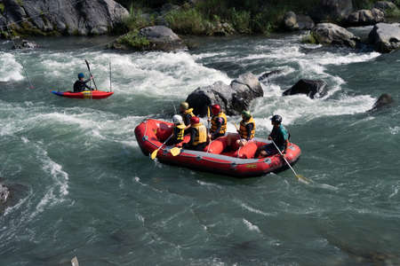 Okutama, Saitama  Japan - 08 26 2021: Dangerous place rafting with team work in safetyのeditorial素材