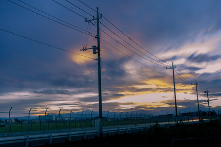 Sunset on blue sky and light line. Blue sky with some clouds. Dramatic sky Golden sun beautiful...