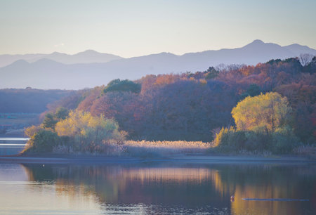 Autumn landscape with lake and mountains in the background, South Koreaの写真素材