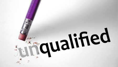 Eraser changing the word Unqualified for Qualified の写真素材