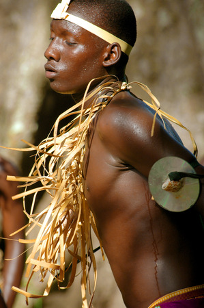 SENEGAL - SEPTEMBER 19: Men and kids in the traditional struggle (wrestle) clothes of Senegal dancing before fighting, on September 19, 2007 in Casamance, Senegal のeditorial素材