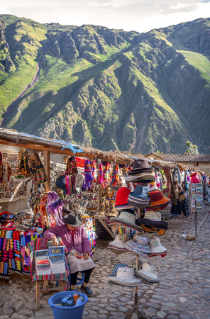 OLLANTAYTAMBO, PERU - DECEMBER 09: Old Inca fortress and market in the Sacred Valley in the Andes mountains of Cusco, December 09, 2011 in Ollantaytambo, Cusco, Peru のeditorial素材
