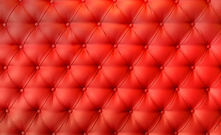 Luxury red leather cushion close-up backgroundの写真素材