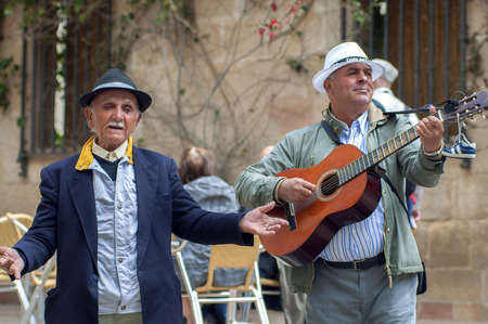 MALAGA, SPAIN - APRIL 29: Two men playing spanish guitar and singing flamenco music in the streets, on April 29, 2009, in Malaga, Spain.のeditorial素材