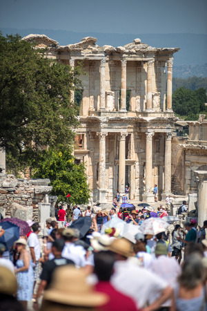EPHESUS, TURKEY - AUG 01: visitors in Curetes street on August 01, 2014 in Ephesus, Turkey. Ancient Ephesus contains the largest collection of Roman ruins in the eastern Mediterraneanのeditorial素材