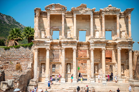 EPHESUS, TURKEY - AUG 01: visitors in Curetes street on August 01, 2014 in Ephesus, Turkey. Ancient...