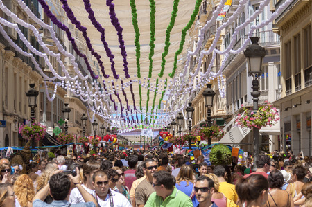 MALAGA, SPAIN - AUGUST, 14: Larios street full of people at the Malaga August Fair on August, 14, 2009 in Malaga, Spainのeditorial素材