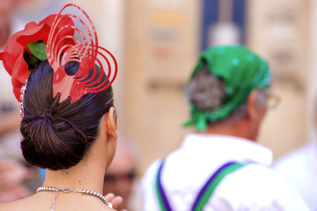MALAGA, SPAIN - AUGUST, 14: Dancers in flamenco style dress at the Malaga August Fair on August, 14, 2009 in Malaga, Spainのeditorial素材