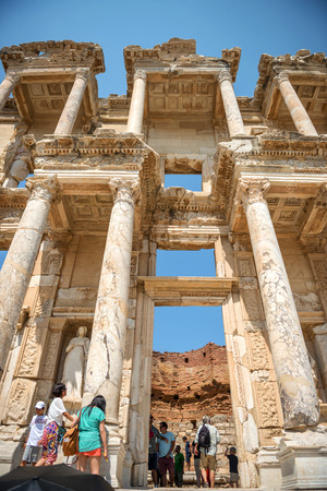 EPHESUS, TURKEY - AUG 01: visitors in Curetes street on August 01, 2014 in Ephesus, Turkey. Ancient Ephesus contains the largest collection of Roman ruins in the eastern Mediterraneanのeditorial素材