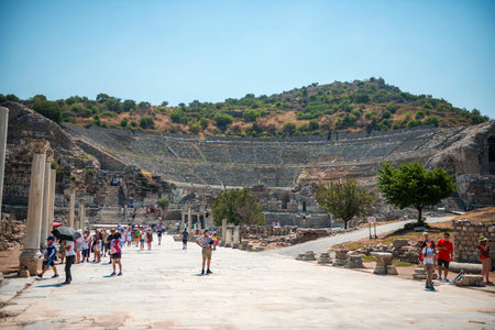 EPHESUS, TURKEY - AUG 01: visitors in Curetes street on August 01, 2014 in Ephesus, Turkey. Ancient...