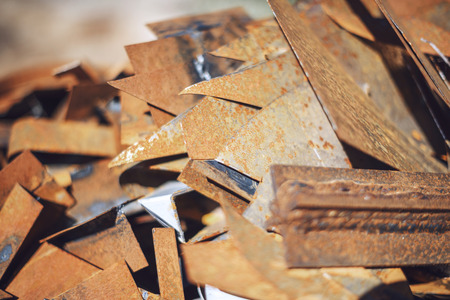 Closeup pile of scrap metal junk garbageの写真素材