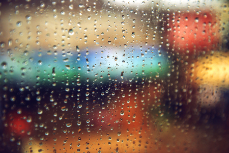 Rain drops on the window. Abstract color texture backgroundの写真素材