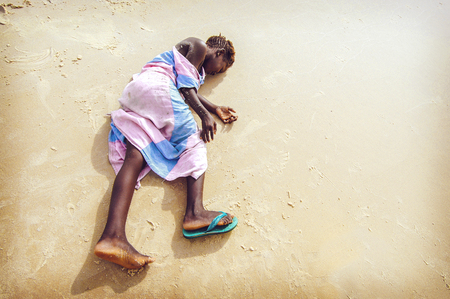 SENEGAL - SEPTEMBER 16: unidentified girl from the island of Carabane posing and playing with the camera, September 16, 2007 in Carabane, Casamance, Senegalのeditorial素材