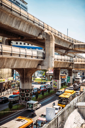Bangkok, Thailand - June 15, 2015: Traffic jam in a main avenue of Bangkok. Jams are a constant in...
