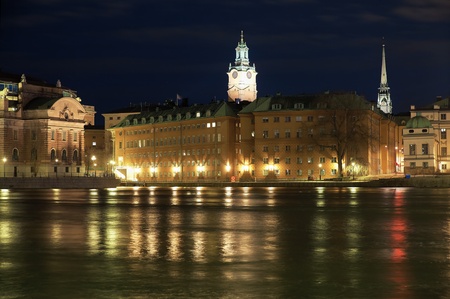 Stockholm, night view of the Gamla Stan, fragment of the Sveriges Riksdag (Parliament of Sweden), Storkyrkan (The Great Church) and Tyska Kyrkan (The German Church), Swedenの写真素材