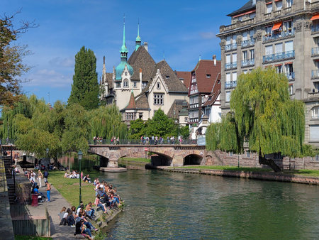 The building of International Lyceum of Pontonniers and Youth on the embankment of the Ill river in Strasbourg, Franceのeditorial素材