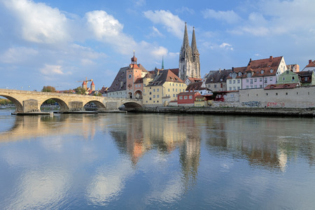 View from Danube on Regensburg Cathedral and Stone Bridge in Regensburg, Germanyの写真素材