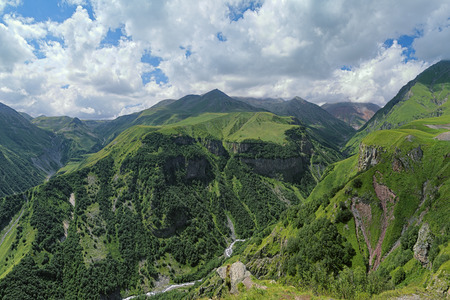 View of the canyon of White Aragvi river from the lookout platform on the Cross Pass (Gudauri Pass), Caucasus Mountains, Georgiaの写真素材