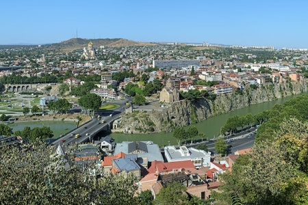 View of Tbilisi districts Avlabari and Metekhi with Holy Trinity Cathedral and Metekhi church,...