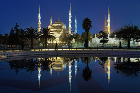 Sultanahmet Mosque (Blue Mosque) reflected in the pool of fountain in early morning, Istanbul, Turkeyの写真素材