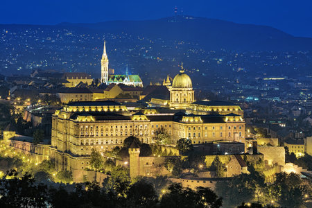 Budapest, Hungary. Buda Castle with Royal Palace and Matthias Church at evening, view from Gellert Hill.のeditorial素材