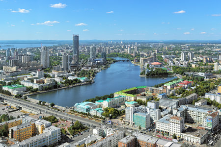 YEKATERINBURG, RUSSIA - AUGUST 19, 2016: View of the city pond, historical center and Yekaterinburg-City district from the observation deck on the 52nd floor of Vysotsky skyscraper.のeditorial素材