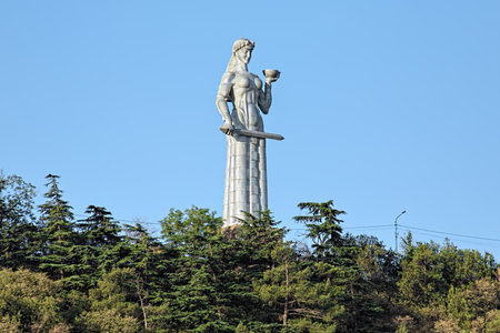 TBILISI, GEORGIA - AUGUST 16, 2014: Kartlis Deda (Mother of Georgia) Monument. The monument by the Georgian sculptor Elguja Amashukeli was erected on the top of Sololaki hill in 1958 to commemorate the 1500th anniversary of Tbilisi.のeditorial素材